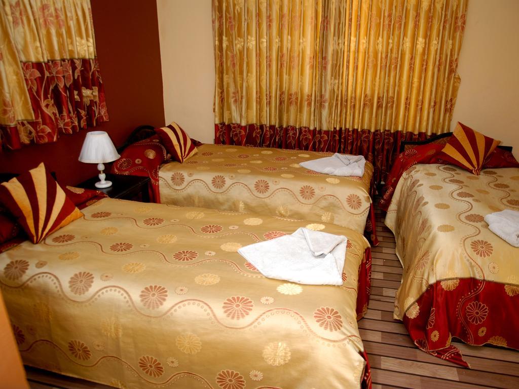 Elbrus Home Kathmandu Phòng bức ảnh