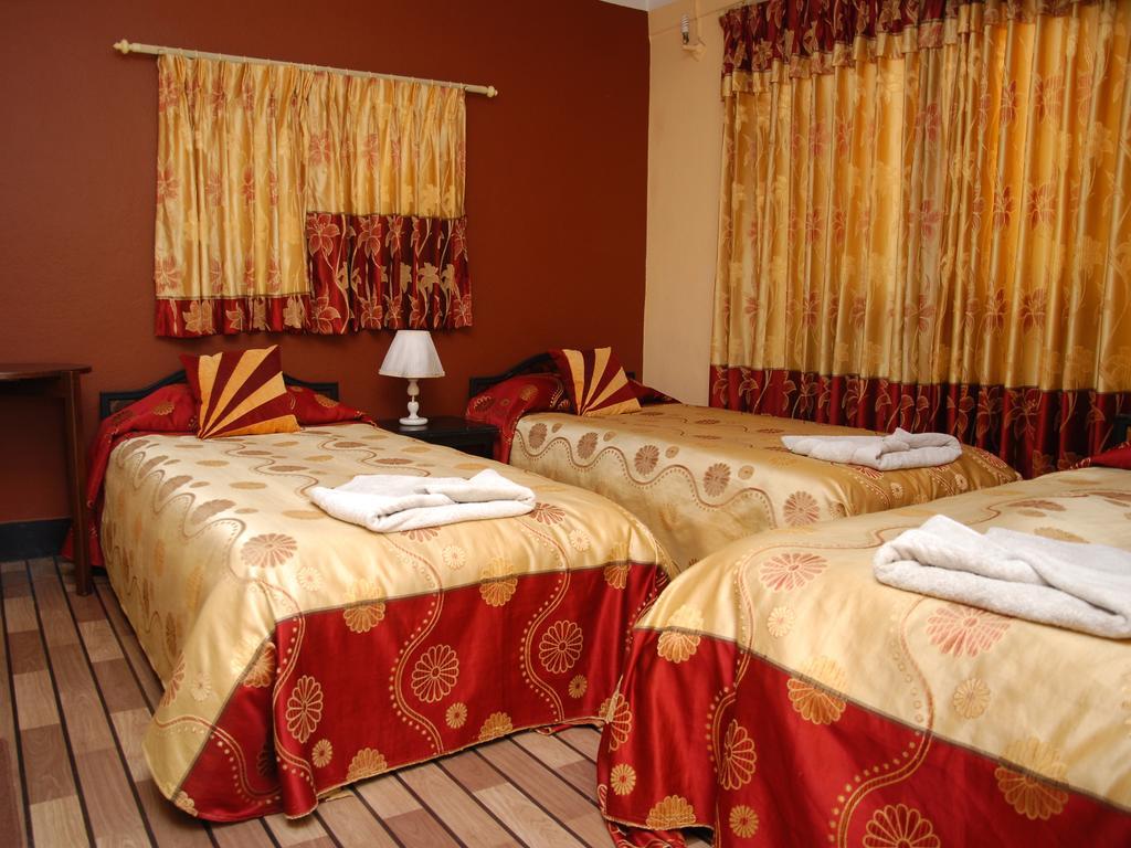 Elbrus Home Kathmandu Phòng bức ảnh